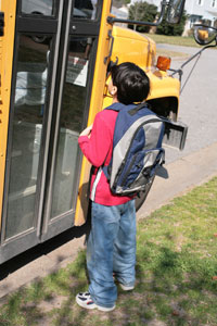 teen waiting to get on the bus