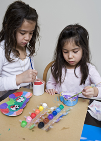 young girls painting