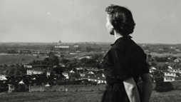 A woman viewing Washington, D.C. from St. Elizabeths Hospital in 1955.