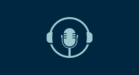 Icon of a microphone within a circle on a blue background