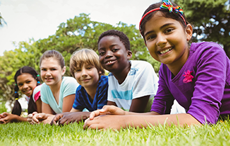 Happy children on grass