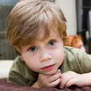 photo of young boy with curious expression