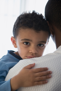 man holding boy