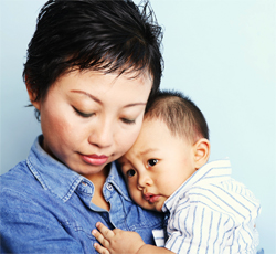 mother holds baby boy