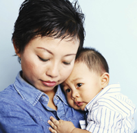 mother holds baby boy