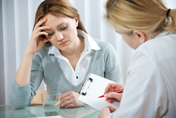 female patient with doctor