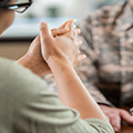 A mental health provider talks with a veteran.