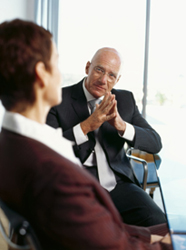 man talking to woman