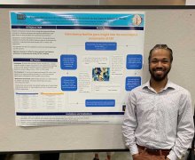 Kenny Fling stands in front of his poster on “Assessing Attributions of Irritability Symptom Improvement during Cognitive Behavioral Therapy” at the American Psychological Association annual meeting.