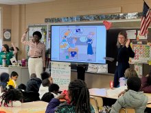 NNT lab staff teaching elementary school students about science and the brain